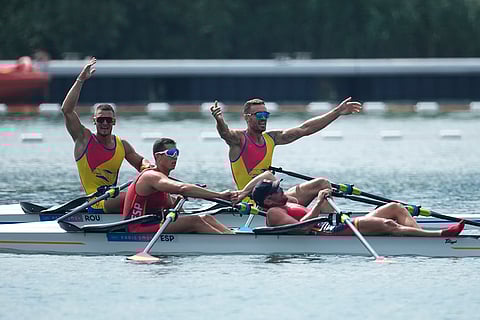 Andrei Sebastian Cornea and Marian Florian Enache react at the finish area